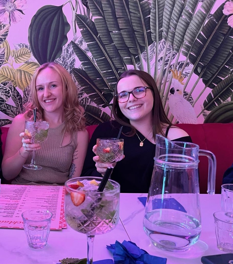 Claire enjoying cocktails with a friend